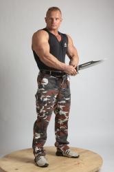 Man Adult Muscular White Fighting with sword Standing poses Casual